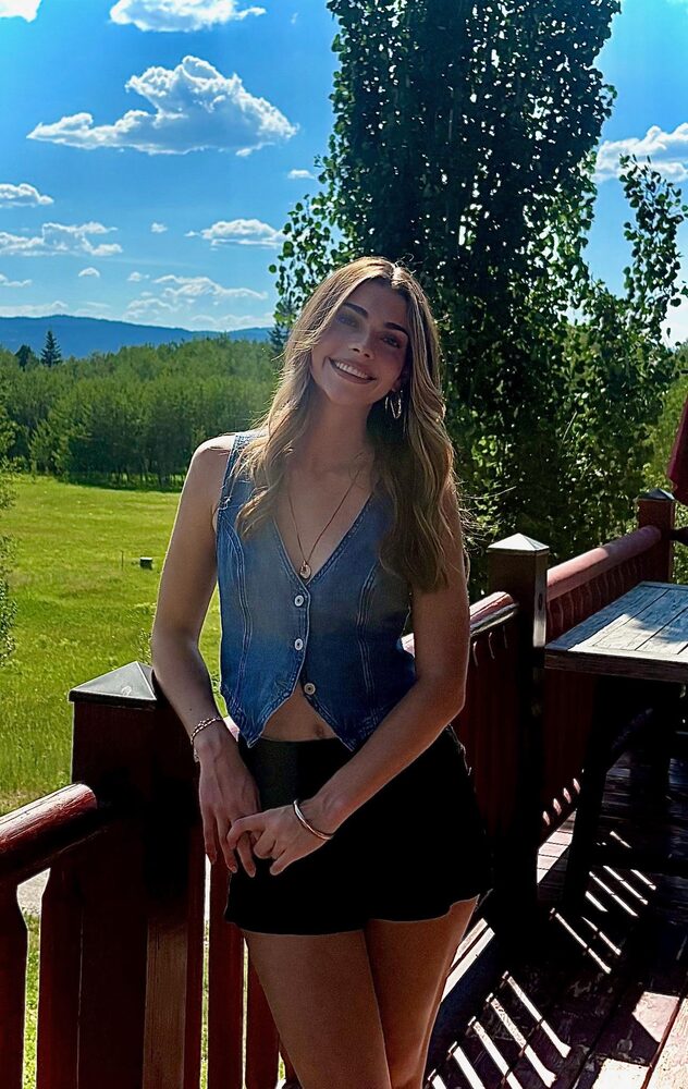 Paris on a porch in the mountains