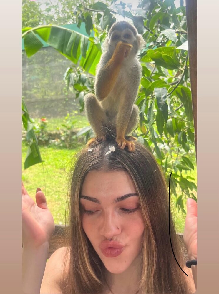 Paris with a monkey on her head